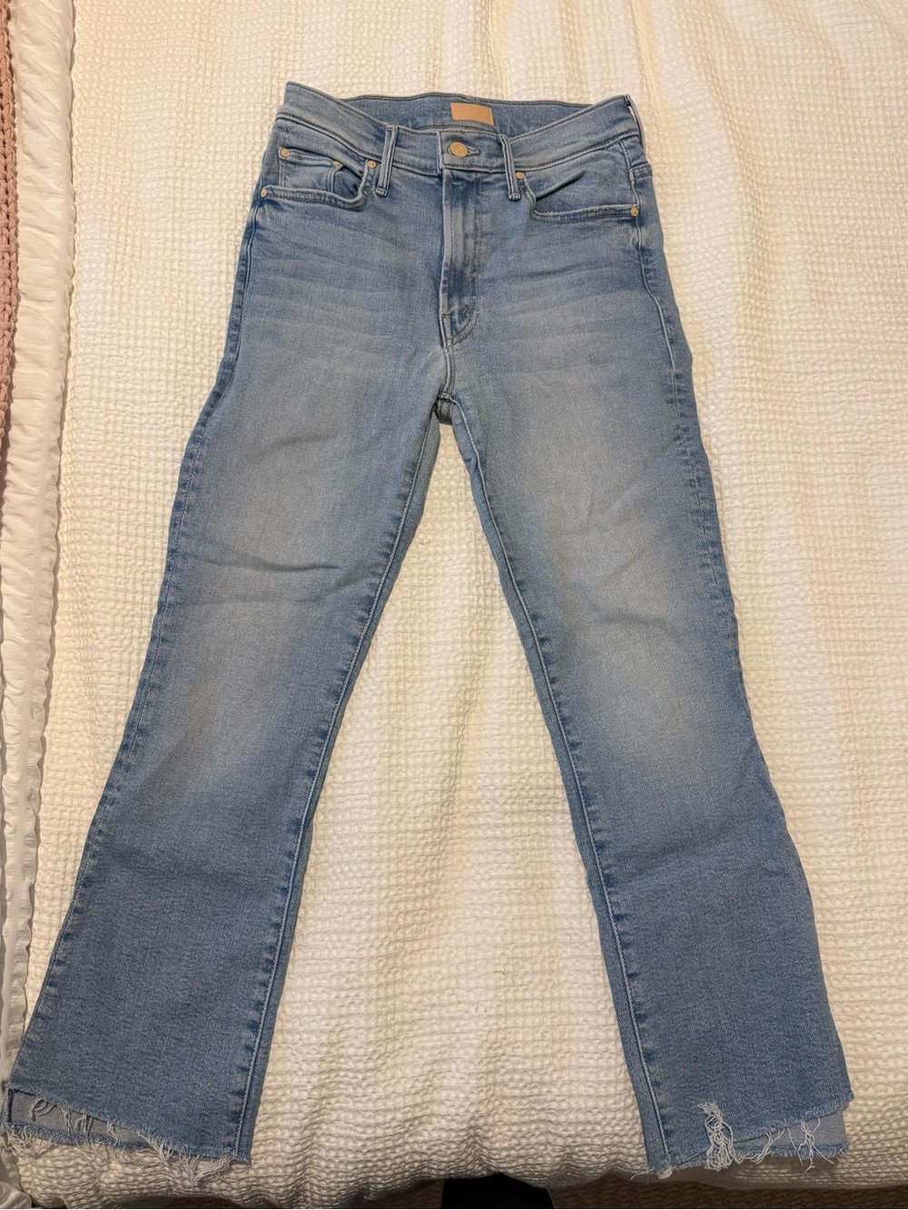 MOTHER Light Blue Flare Jeans with Raw Hem